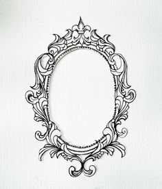 a black and white photo frame with an ornate design