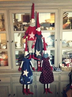 several christmas decorations on display in a kitchen