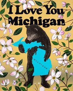 i love you michigan with a bear holding a blue heart surrounded by flowers and leaves