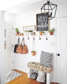 the entryway is clean and ready for guests to use it as a storage space