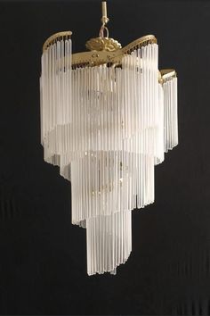 a chandelier hanging from the ceiling in a room