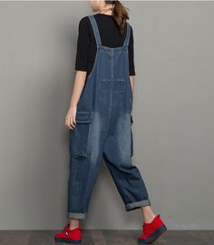 Denim Casual Spring Denim Overall Women Jumpsuits Casual Indigo Jeans For Spring, Blue Denim Jumpsuit With Side Pockets For Spring, Spring Blue Denim Jumpsuit With Side Pockets, Indigo Baggy Casual Jeans, Baggy Indigo Casual Jeans, Casual Blue Denim Jumpsuit With Pockets, Dark Wash Wide Leg Cotton Overalls, Casual Cotton Denim Jumpsuit Non-stretch, Casual Solid Denim Jumpsuit For Spring