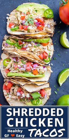 shredded chicken tacos with tomatoes, avocado and cilantro on the side