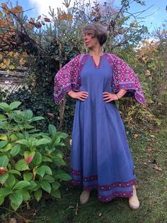 Vintage 70s Indian maxi dress. Blue cotton full length dress with red blue wood block printed angel sleeves. Boho, Hippie dress. Made of flowing heavyweight partly faded blue cotton fabric, sleeves made of block printed cotton fabric. Small defects on the pits, already fixed (see on last photo) To fit size S/M/L Bust 39" 99cm Length 55,5" 141cm Hippie Blue Long Sleeve Maxi Dress, Bohemian Blue Patchwork Maxi Dress, Blue Long Sleeve Patchwork Maxi Dress, Blue Patchwork Hippie Dress, Hippie Blue V-neck Dress, Indian Maxi Dress, Indian Maxi, Full Length Dress, Hippie Dresses