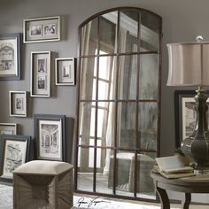 This Antiqued Mirror Features A Hand Forged Metal Frame Finished In Heavy Maple Wash With Gold Highlights And Burnished Details. Large Arch Mirror, Decorative Ceiling Panels, Floor To Ceiling Curtains, Floor To Ceiling Bookshelves, Antique Windows, Arched Mirror, Living Room Photos, H Design, Arch Mirror