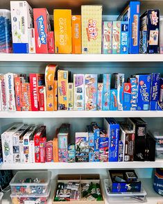 the shelves are filled with many different types of snacks and candy bars, including one for sale