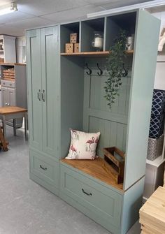 a room filled with lots of furniture and shelves on top of it's walls