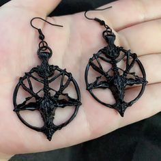 Bring out your gothic side with these eye-catching black pentagram baphomet head round earrings. crafted from zinc alloy, these earrings are perfect for adding a touch of punk to any outfit. get your pair today! Pan God, Goat Head, Occult Fashion, Goth Earrings, Witch Earrings, Witch Jewelry, Black Goth, Goth Jewelry, Punk Jewelry