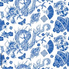 a blue and white wallpaper with dragon designs on it's side, in the middle