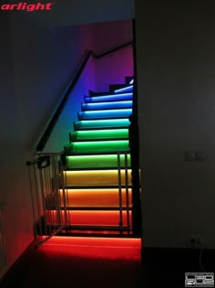 the stairs are lit up with colorful lights