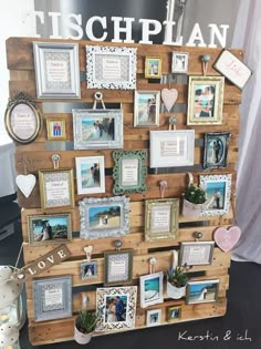 there is a display with many pictures on it