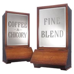 two wooden boxes with signs on them that say fine and chocory, coffee and blend