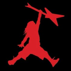 the silhouette of a basketball player with an arrow in his hand, against a black background