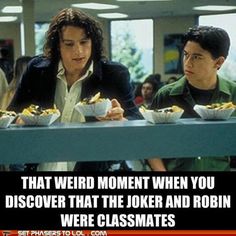 two people sitting at a table with food in front of them and the caption that says, that moment when you find out the joker & robin went to high school together