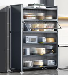 a metal shelving unit in a kitchen with lots of containers on top of it