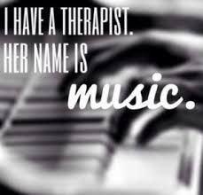 a black and white photo with the words i have a therapist her name is music