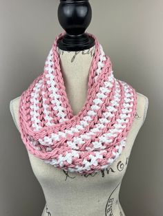 Handmade crochet infinity scarf  Yarn is 100% acrylic  Colors: soft rose, white striped (I)  Width is 5 inches  Length is 60 inches  Care Instructions: hand wash and lay flat to dry White Crochet Scarf One Size, Handmade White Scarves For Spring, White Hand Knitted Scarf One Size, Pink Crochet Scarves, White Hand Knitted Scarf, White Crochet Scarf, Scarf Chunky, Scarf Yarn, Crochet Infinity Scarf