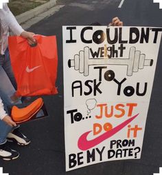 a woman holding a sign that says i couldn't weight ask you to just do it be my date?