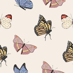 a group of butterflies flying through the air on top of a pink background with gold dots