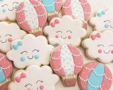 decorated cookies are arranged in the shape of hot air balloons