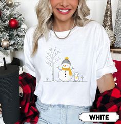 Celebrate the festive season in style with our Merry Christmas Snowman Comfort Colors T-shirt! This adorable holiday shirt features a cheerful snowman, making it the perfect addition to your family Christmas wardrobe.   Product Info  Comfort Colors® 1717 is garment dyed and made with 100% ring-spun cotton. Fabric is Pre-Shrunk Relaxed Fit  Care Instructions  Turn Garment Inside Out Machine Wash on COLD DO NOT IRON PRINT Do Not Dryclean Dry on Low Settings   Sizing  ✺ Sizing is unisex  ✺ For adults, size runs like men's, though not overly large. Most women find their typical size works best, since they are meant to fit a touch loose and go up 1 or 2 sizes if you want the oversized look. ✺ Size guide and fit:  The size chart is listed in photos above.  Please use the measurement for the most Merry Christmas Snowman, Christmas Shirts For Women, Christmas Wardrobe, Snowman Shirt, Little Sister Gifts, Happy Xmas, Comfort Colors Tshirt, Festival Shirts, Make Her Smile