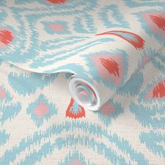 a blue and red wallpaper with an abstract design on it's surface,