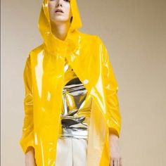 Top Fall Trend , Yellow Plastic Anorak, Light Weight And Waterproof. Made In Italy. Size S-M. Yellow Hooded Raincoat For Fall, Hooded Yellow Raincoat For Fall, Yellow Oversized Hooded Outerwear, Yellow Spring Outerwear With Detachable Hood, Yellow Long Sleeve Raincoat For Spring, Spring Yellow Outerwear With Detachable Hood, Spring Long-sleeve Windbreaker For Rainy Weather, Spring Windbreaker With Detachable Hood For Rainy Weather, Long Sleeve Yellow Raincoat For Spring