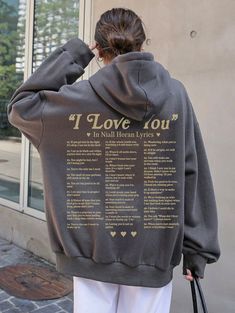 the back of a woman's hoodie that reads, i love you in all human languages