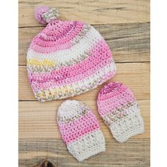 Baby beanie hat & mitten set. This adorable hat is knotted at the top. The mittens are thumbless to protect baby from scratching.  Handmade crochet in unisex colors for the newborn infant. Gorgeous soft yarn in shades of pink & yellow are used for this hat & mitten set.  Made with 100% acrylic yarn. Baby hats, winter essentials, baby shower gifts Christmas gifts. Keep your little one warm & stylish this winter with wonderful handmade!  Size 0- 3 months. Machine wash, gentle cycle. Lay flat to dry. Baby Knot Hat, Baby Beanie Hat, Baby Shower Christmas, Hats Winter, Baby Beanie Hats, Beanie Cap, Baby Protection, Hat Beanie, Crochet Baby Hats