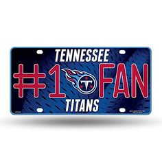 tennessee titans license plate with the number one fan on it's front and side