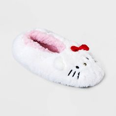 Step into comfort and style with Women's Faux Fur Hello Kitty Slipper Socks with Grippers. Crafted with durable knit fabric, these slippers offer cozy comfort. The mid weight fabric provides the perfect balance of warmth and breathability. Featuring a hello kitty design and secure grippers, this product makes a perfect addition to your lounge wear collection. Cute Soft Synthetic Slippers, Playful Indoor Synthetic Slippers, Playful White Synthetic Slippers, White Novelty Socks For Winter, Novelty White Socks For Winter, White Synthetic Winter Slippers, Cute Winter Socks With Cat Design, Cute Cat Design Socks For Winter, Cute Cat Design Winter Socks