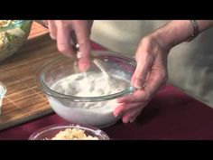 someone is mixing some food in a bowl