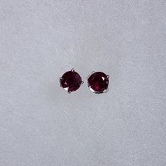 Pigeon Blood Ruby Stud Earrings- Vintage These Earrings Are Absolutely One Of My Favorite Pair! I Bought These About 7 Years Ago. I Just Love Rubies! Next To Diamonds It's One Of My Favorite Stones!! Here Is What I Know About These Beauties: They Are Natural Pigeon Blood Ruby Stud Earrings Sitting In 14karat White Gold Stud Casing. These Earrings When I Purchased Them Were Valued At About $3,000. They Are 2 Carats Total Weight For The Pair Of Rubies. Red Clip-on Earrings For Anniversary, Oval Red Ruby Earrings, Red Ruby Single Earring, Vintage Red Clip-on Earrings For Anniversary, Red Ruby Pear-shaped Earrings, Blood Ruby, Ruby Earrings Studs, White Gold Studs, Pigeon