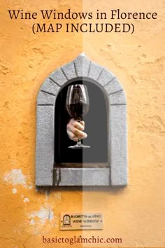 a hand holding a wine glass in front of a window with the words wine windows in florence map included