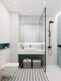 a bathroom with black and white tile flooring, a sink, toilet and shower