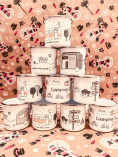 there are many cups that have camping designs on them