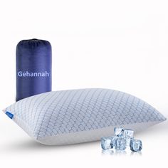 an ice pack next to a pillow with the name gehannah on it and three pieces of ice