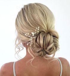 Bun Inspirations - Makeup Wearables Maid Of Honor Hairstyles Low Buns, Low Bun Updo Bridesmaid, Bridesmaid Hair Updo With Flowers, Bridesmaid Hair Low Updo, Low Messy Bridal Bun, Loose Low Bun Hairstyles, Bridesmaids Low Bun, Relaxed Updo Hairstyles, Formal Low Bun Hairstyles