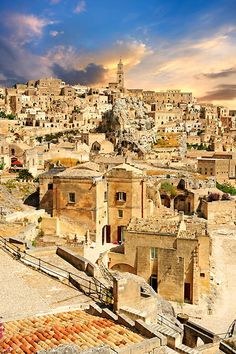 an old city with lots of buildings on the top and one building in the middle