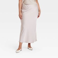 Dress up for brunches, lunches or dinners in chic style with this Maxi Slip Skirt from A New Day™. This maxi-length slip skirt is made from lightweight satin fabric for all-day comfort, while the full elastic waistband lends a secure fit. Tailored in a high-rise silhouette with a slim fit for a flattering look, you can pair this skirt with your fave tops and footwear for versatile ensembles. A New Day™: Style that goes wherever you do. Maxi Slip Skirt, Slip Skirt, Women Maxi, Womens Tie, Bottom Clothes, A New Day, Satin Fabric, New Day, Dresses Online