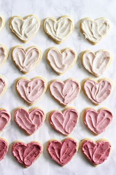 heart shaped cookies with frosting in the shape of hearts