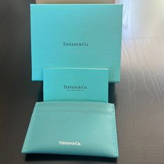 Brand New With Box Except For The Small Flaw Shown In The Picture. Designer Blue Bags With Card Slots, Blue Designer Bags With Card Slots, Elegant Blue Wallets, Elegant Blue Evening Wallets, Elegant Evening Blue Wallets, Elegant Blue Wallets With Interior Card Slots, Luxury Blue Wallet For Formal Occasions, Card Holder With Original Box As Gift, Blue Rectangular Card Holder For Formal Occasions