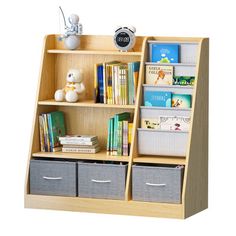 a bookshelf with three bins and two stuffed animals