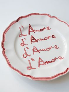 a plate with writing on it that says i ame d'avance d'amaire