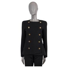 100% authentic Chanel double-breasted tweed jacket in black wool (with 2% polyamide). Features a tailored silhouette with a round neck and two pockets at the waist. Closes with a double row of rhinestone embellished gold-tone metal and black enamel buttons. Lined in black silk (100%). Has been worn and is in excellent condition. 2019 Paris-New York Metiers d'Art Measurements Model 19A P61741 V46964 94305 Tag Size 40 Size M Shoulder Width 39cm (15.2in) Bust From 92cm (35.9in) Waist From 88cm (34. Chanel Blazer, Dior New Look, Vintage Chanel Bag, Chanel Suit, Embroidered Coat, Chanel Jacket, Evening Jackets, Belted Jacket, New Paris