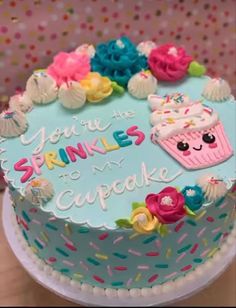 a birthday cake decorated with frosting and sprinkles