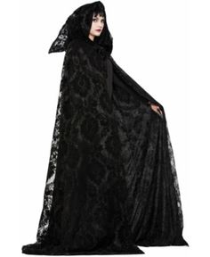 a woman wearing a black hooded cloak