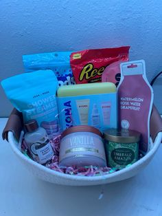 a white bowl filled with lots of different types of beauty products and condiments