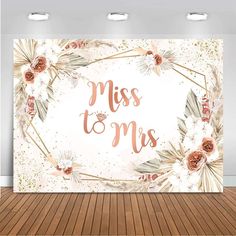 a white wall with flowers and the words miss to me on it in gold foil