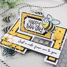 a close up of a card with a bee on it and the words happy bee day